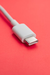USB cable type C over orange background