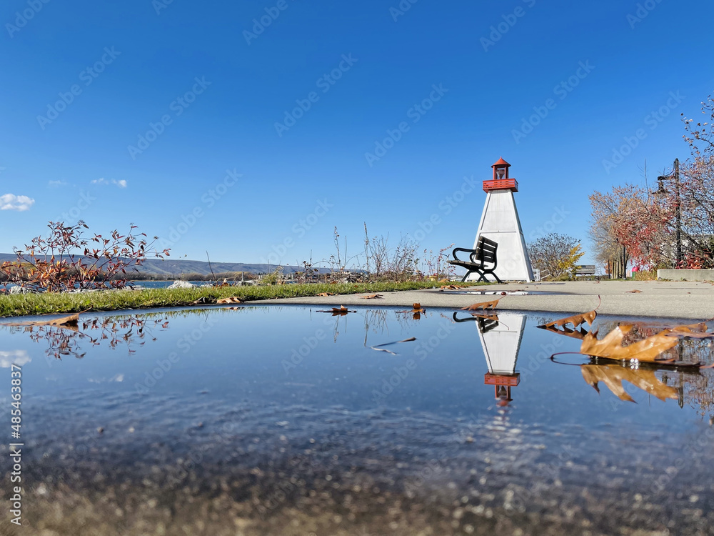 Sticker A beautiful view of the Saugeen River Range Front Lighthouse against a blue sky