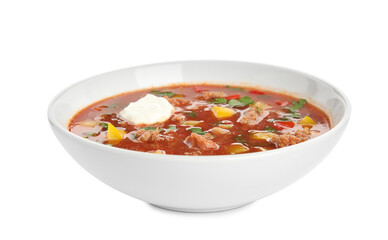 Bowl of delicious stuffed pepper soup on white background