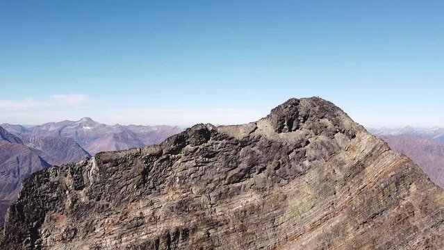 High alpine peak with a background reveal, pedestal shot, Purcell mountains