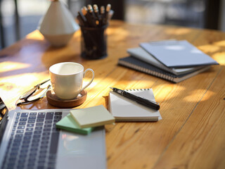 An office supplies on wooden table. close-up