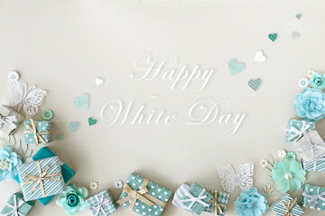 Fototapeta na wymiar Happy　White　Day　ブルーのプチギフトと白い背景素材