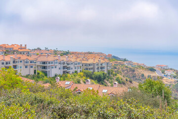 Fototapeta na wymiar Apartment buildings on top of a mountain in Laguna Niguel in California