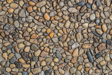Colorful round pebble stone texture for wallpaper and background. Abstract background. Texture background. Macro photography. Close up