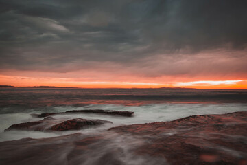 Obraz premium sunrise long exposure at the beach