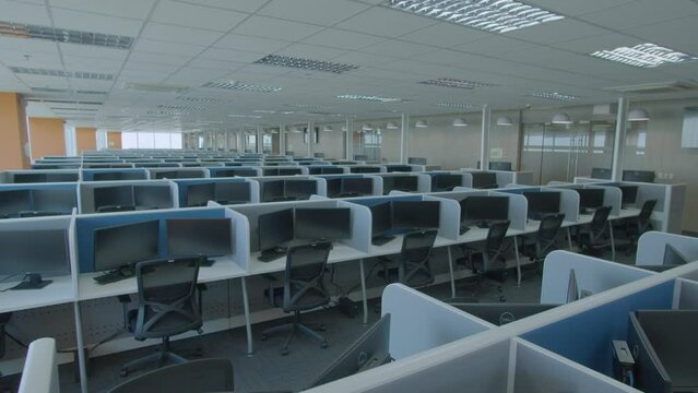 Dolly In Shot In An Empty Call Center BPO Office In Daytime
