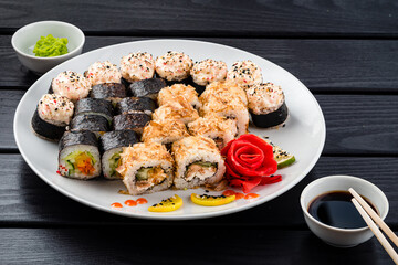 Sushi roll set in restaurant served in white plate Japan cuisine
