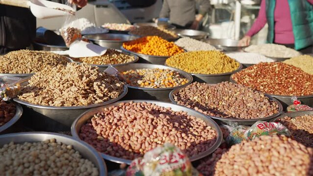 Antalya, Turkey - 5th of February 2022: 4K Big selection of Turkish nuts seeds and snacks. High quality 4k footage