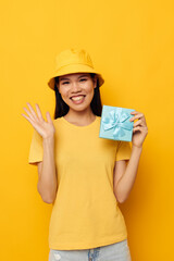 Charming young Asian woman blue gift box holiday birthday Lifestyle unaltered