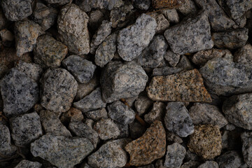 Dark rough edges stone gravel texture for wallpaper and background. Abstract background. Texture...
