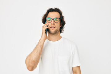 Cheerful man talking on the phone technologies isolated background