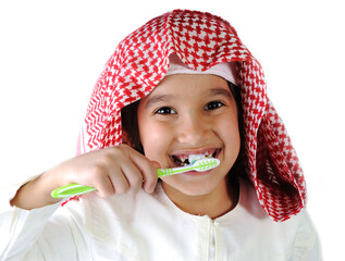Arabic Muslim kid brushing teeth
