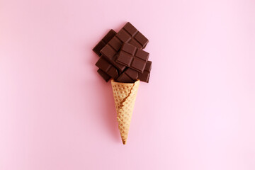 dark chocolate pieces in ice cream cone.