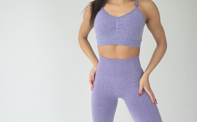 Closeup picture of sporty fit black woman in sport clothes.