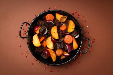 Concept of tasty food with beef with vegetables, top view