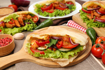 Concept of tasty food with pitas with chicken, close up