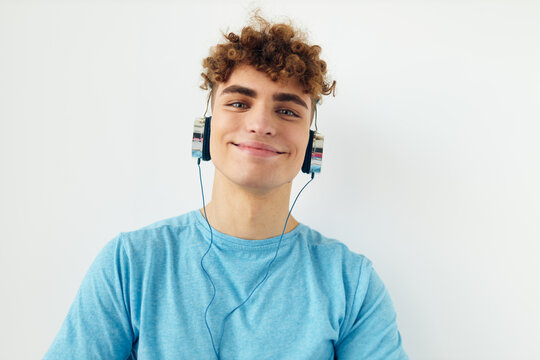 handsome young man music technology entertainment unaltered