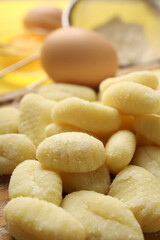 Fototapeta premium Concept of cooking with raw potato gnocchi, close up