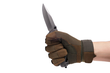 Hand in tactical glove, holding folding knife, on white background.