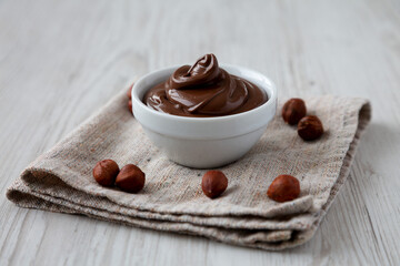 Homemade Chocolate Hazelnut Spread in a Bowl, low angle view.