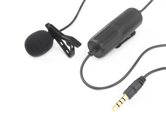 Black lavalier microphone isolated on white background close up