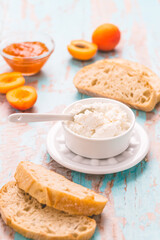 Cottage cheese with ciabatta, fresh fruits and marmalade for breakfast