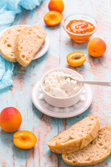 Cottage cheese with ciabatta, fresh fruits and marmalade for breakfast