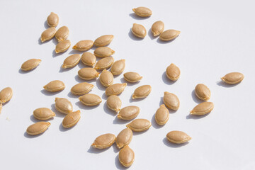 close up Sweet pumpkin seeds isolated white background.
