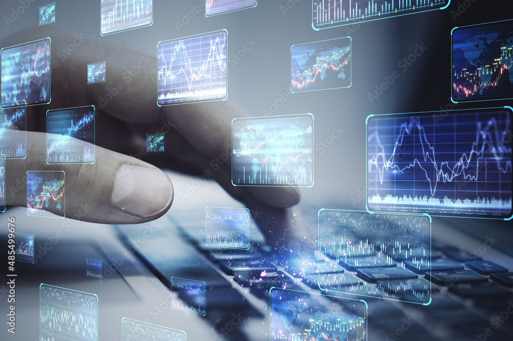 Poster close up of hands using laptop computer with various forex screens on blurry background. cryptocurre