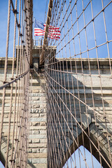 Abstract view of the American Flag and the Brooklyn bridge in the USA