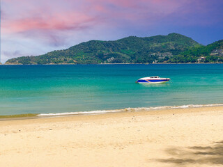 Colourful Sunset Patong Beach lovely vibrant orange, pink and Blue colours Phuket Thailand Thai