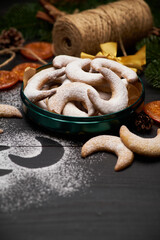 Fototapeta na wymiar Round Gift box full of Traditional German or Austrian Vanillekipferl vanilla kipferl cookies