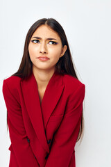 attractive girl in a red jacket cosmetics smile isolated background unaltered