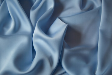 Beautiful draped silk fabric in blue.