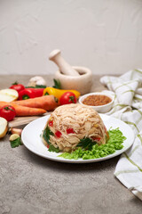 Delicious chicken aspic on a plate on concrete table