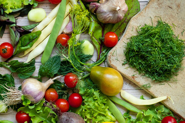Autumn fresh vegetables on wooden table background