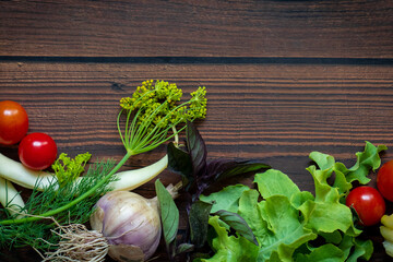 Autumn fresh vegetables on wooden table background