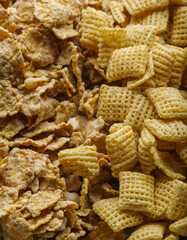 Whole grain breakfasts. Crispy pads and flakes. Close-up. Lots of objects. There is no one in the photo. Healthy lifestyle. Food background.