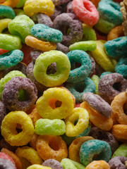 macro photography. Crispy colored fruit rings. Quick breakfasts. Sweet food, natural products. Organic food. Children's and diet food. Supermarket, cafe, restaurant. advertising.