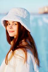 Obraz premium beautiful woman smile Winter mood walk white coat nature