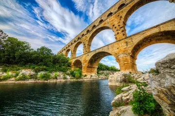 Selbstklebende Fototapete Pont du Gard The Aqueduct Pont du Gard Crossing the Gardon River, Occitanie, France