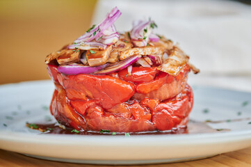 Close-up view of red bell pepper salad with blurry background
