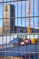 Construction site fence in front of Stuttgart 21 project. Station building. Depth blur. Germany, Stuttgart.