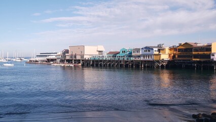 Colorful wooden houses on piles, pillars or pylons, ocean sea water, historic Old Fisherman's...