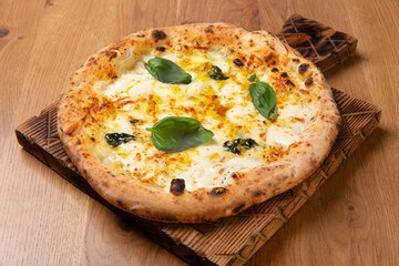 Delicious pizza Formaji with Provala, Parmesan, Mozzarella, Gorgonzola and basil