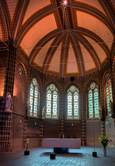 The inside of a church that is located in a monastery in Deventer