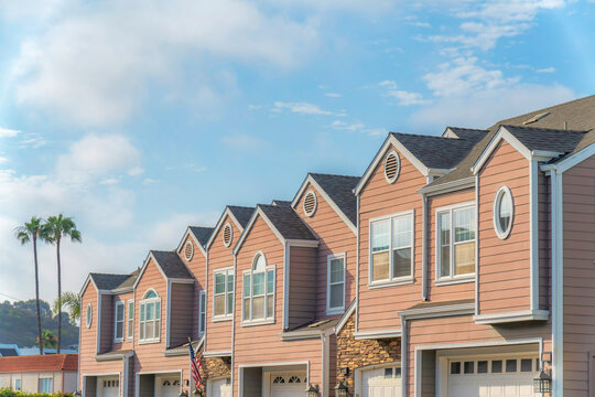 Townhouses with pink wood vinyl sidings at Carlsbad, San Diego, California