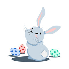 Fototapeta na wymiar little gray easter bunny, around colored eggs
