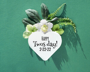Happy Twos day 2.22.22, also known as Twosday, Twos-day. Monochromatic green design element in...