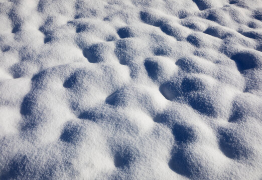 Full frame of snow covered terrain